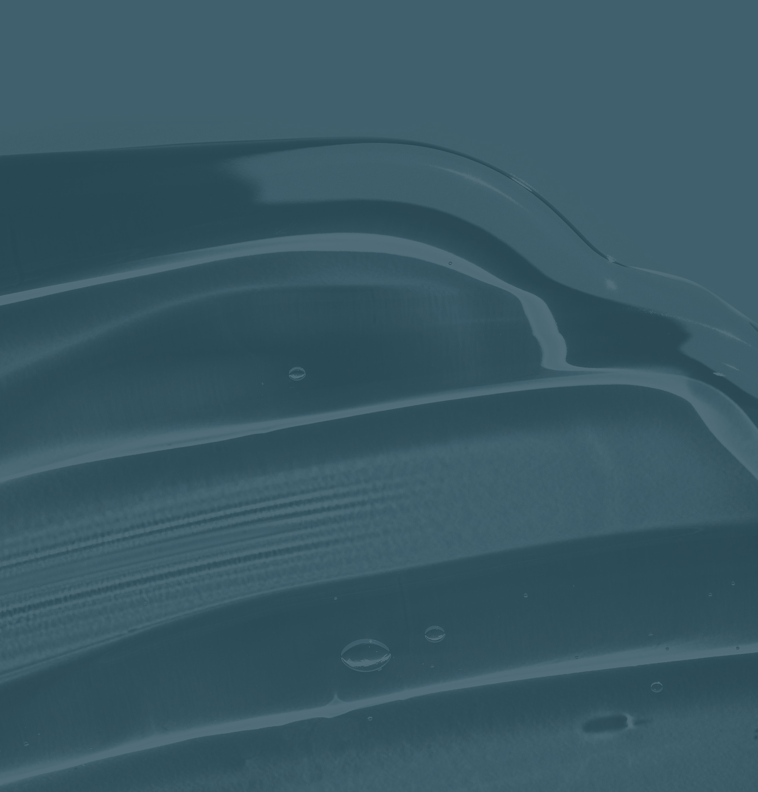 Abstract waves with water droplets on surface.