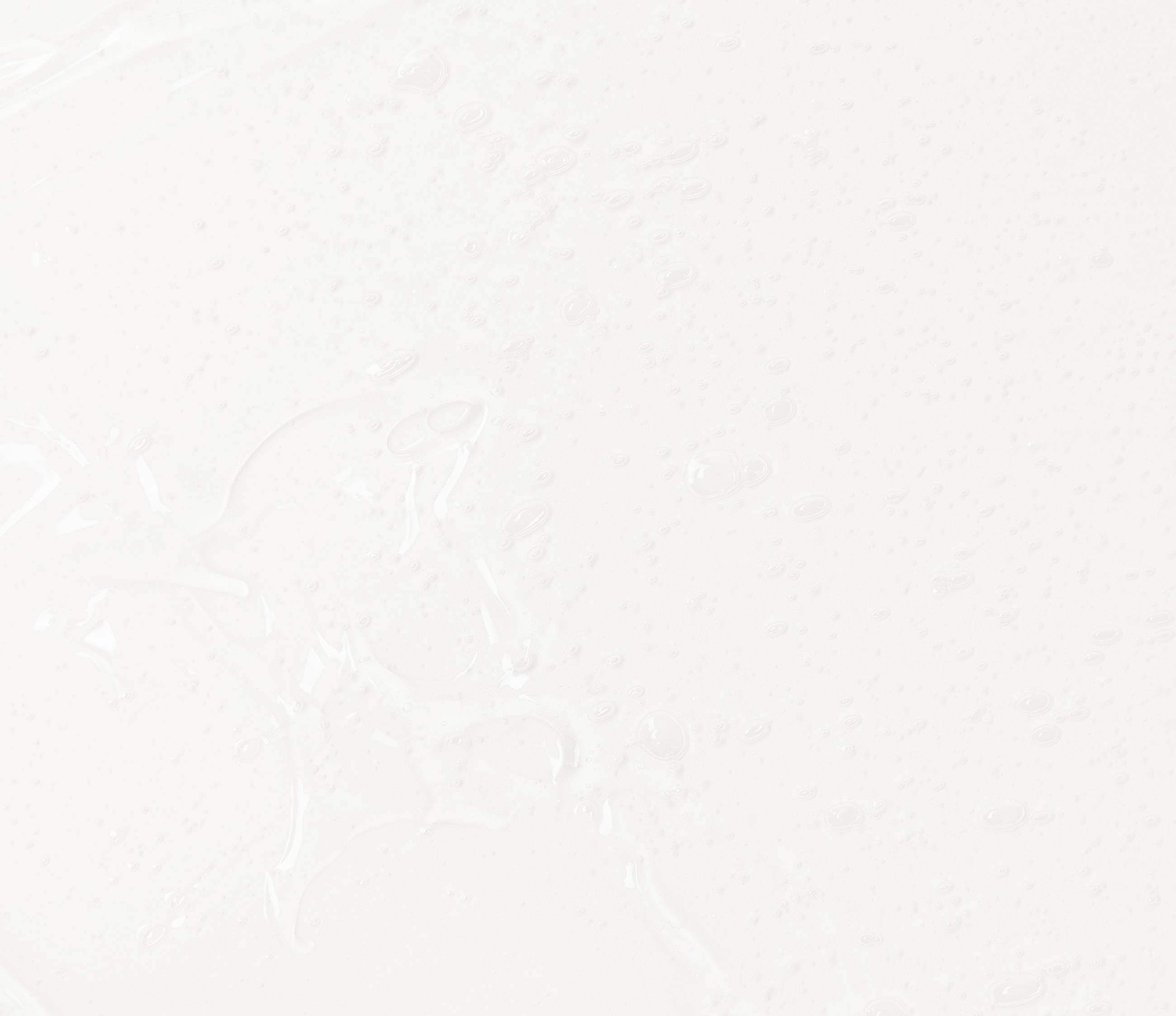 Abstract white texture with subtle water droplets.