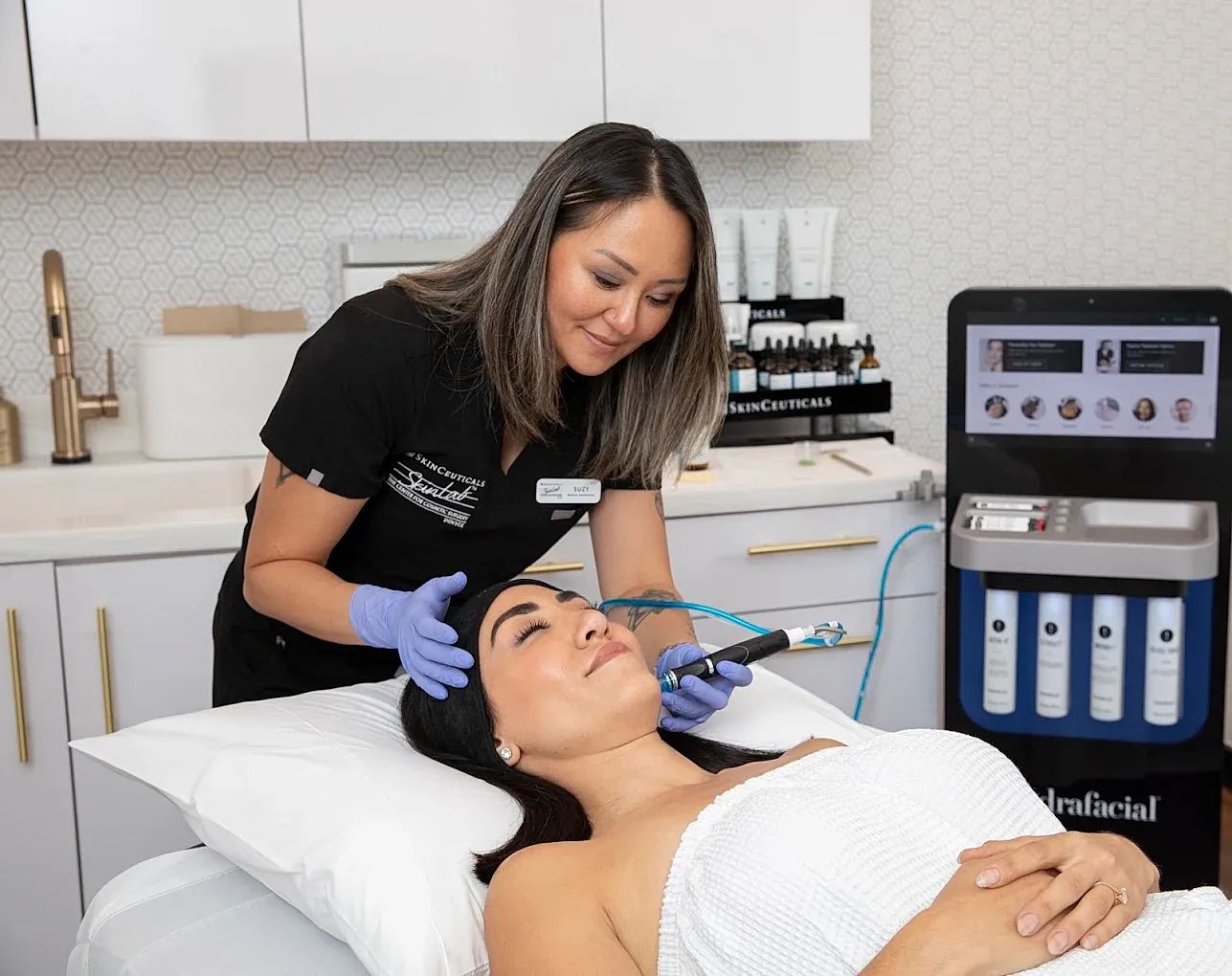 Spa treatment with a skincare professional and client.