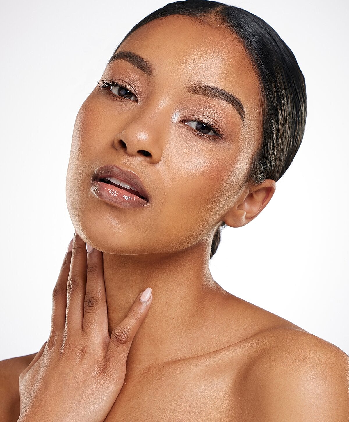 Denver Hydrafacial model with natural makeup and glowing skin.