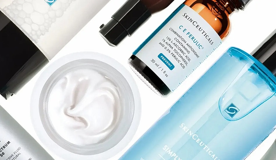 Skincare products arranged aesthetically on white background.