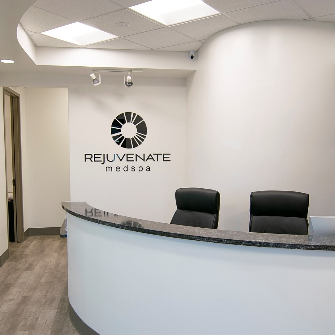 Modern medspa reception area with sleek design.