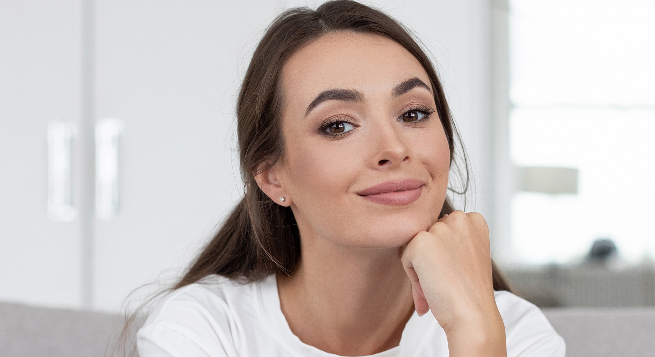 Denver Facial Balancing model with soft features and glowing skin.