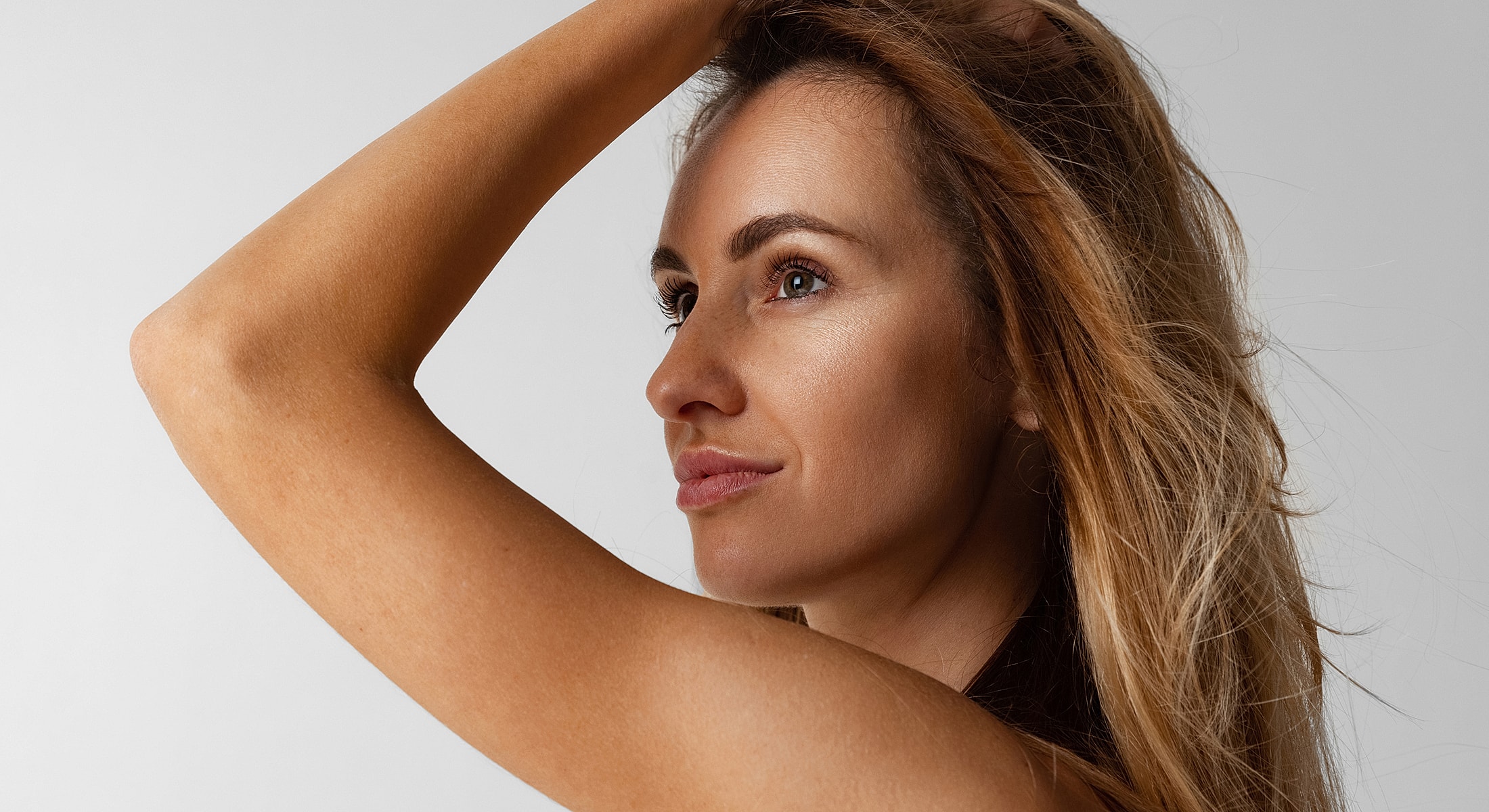 Woman with smooth skin and graceful hands.
