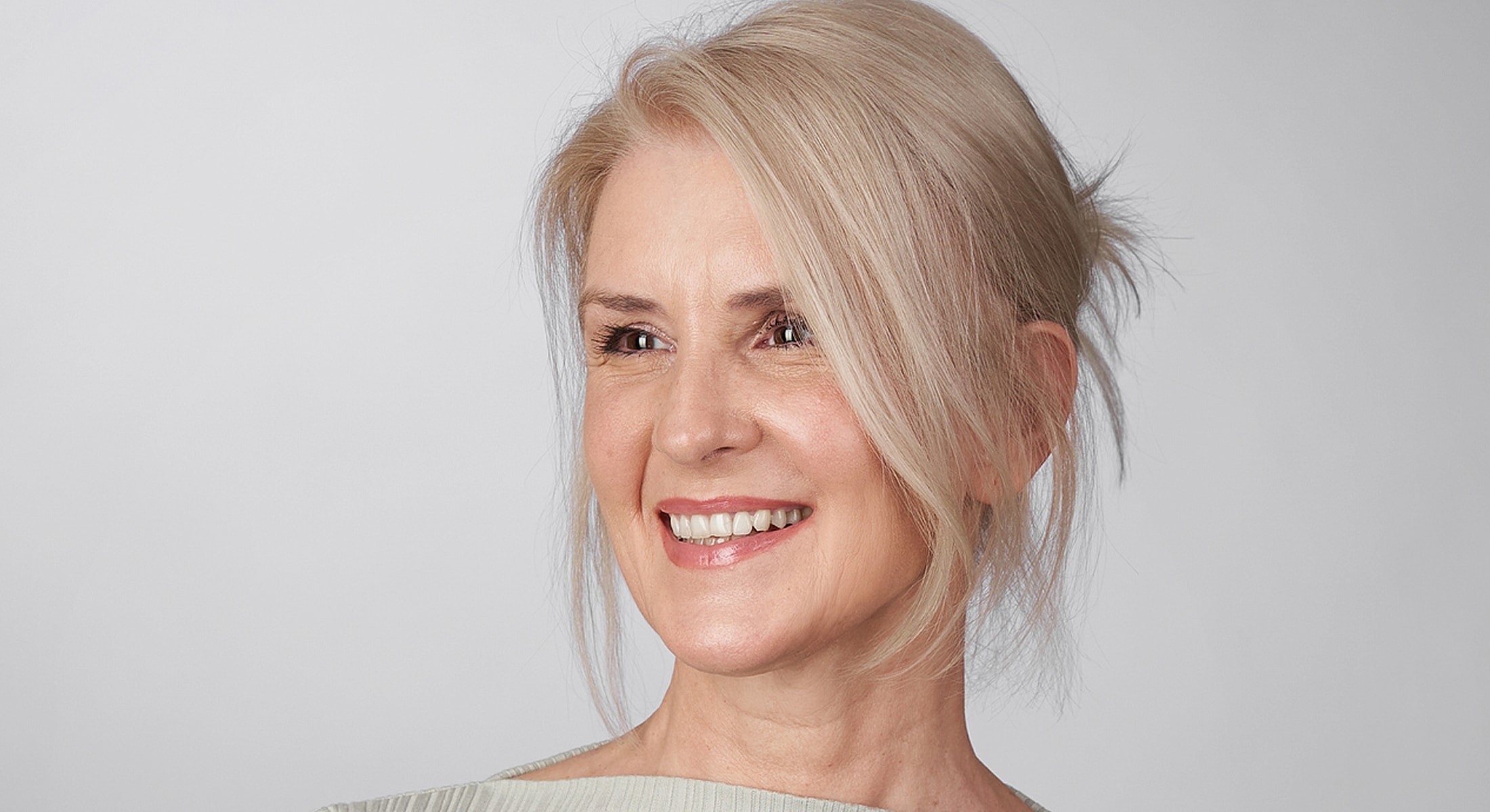 Denver Wrinkle Treatment model with short blonde hair.